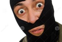 Criminal With Face Mask The Criminal Wearing Mask Isolated On White Stock Photo