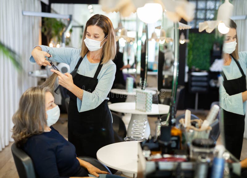 Stylist Doing Hair Hair Stylist Work On Woman Hair In Salon Stock Photo 47445364