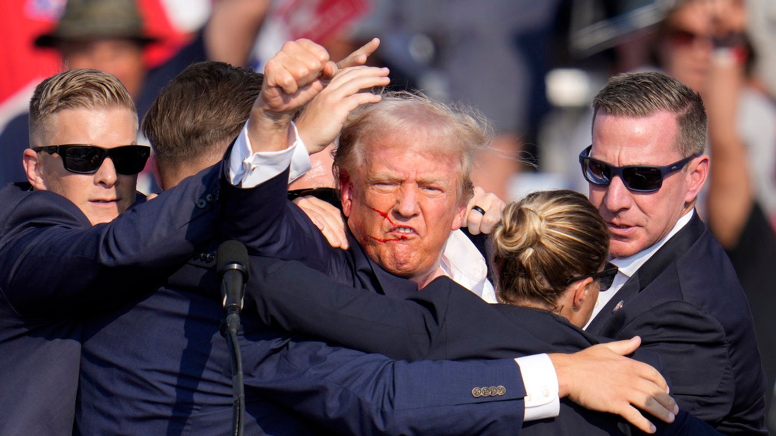 Donald Trump Raised Fist Bloodied Trump With Raised Fist: An Image Likely To Fuel Campaign